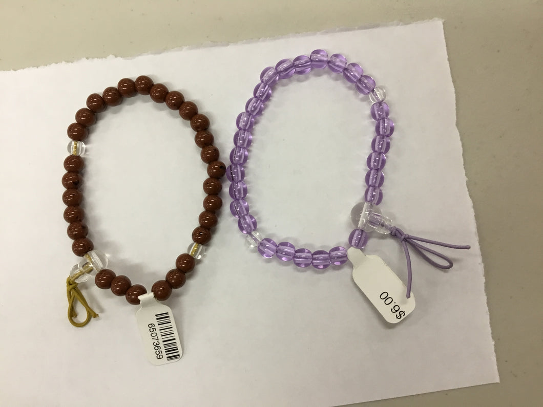 Onenju wristlet with tassels